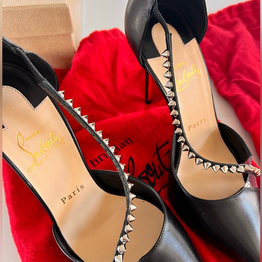 Christian Louboutin. Size 8. Barely worn.